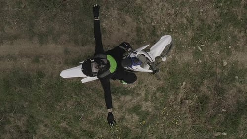 Aerial View of Motocross Bike and Rider on Path
