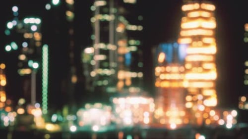 Defocused Bokeh of Cityscape at Twilight Time