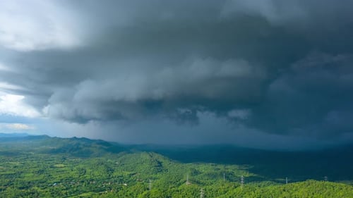 Dramatic Storm Clouds over Green Landscape