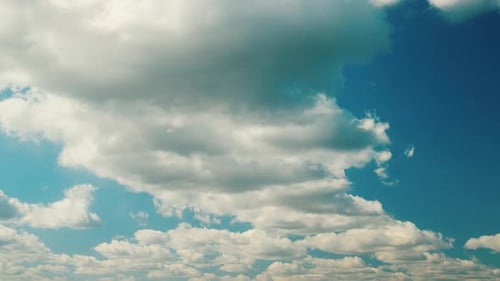 Cloudy Sky With Fluffy Clouds