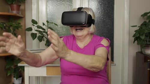 Senior Woman Wearing VR Headset