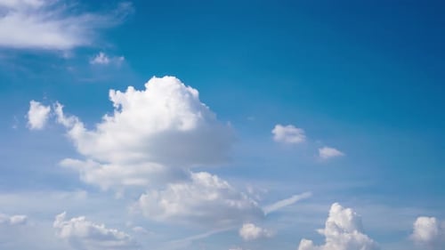 White Clouds Drifting Across a Blue Sky