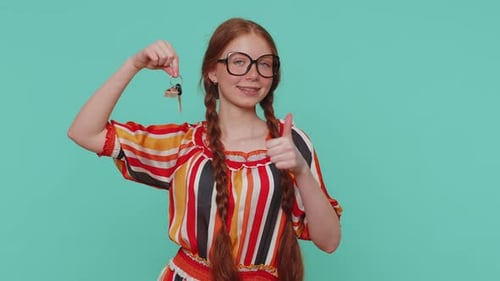 Redhead Girl Real Estate Agent Show Keys of New Home House Apartment Buying Property Mortgage Loan