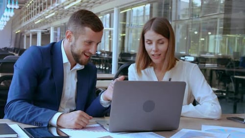 Co Workers Resting in Office