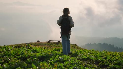 Woman Hiker Enjoying Mountain Top View