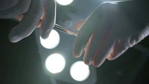 Hands with Surgical Instruments