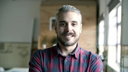 Front View of Cheerful Smiling Young Man with Grey Hair