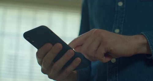 Hands of Young Man Using Smartphone at Home Office. Communication, Online Shopping, Chat, Social