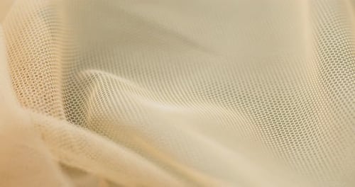 Abstract Close Up of Tan Mesh Fabric