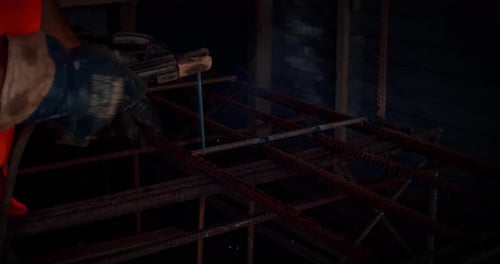 Slow Motion. Welder Welding The Worker Performs Metal Welding at the Factory or Construction Site