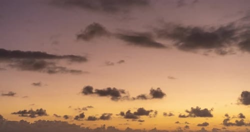 Vibrant Sunset Sky with Rolling Clouds