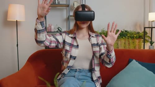 Woman Using VR Headset at Home