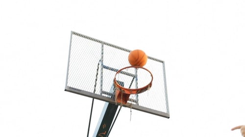 Basketball Throws and Scores into Net and Hoop