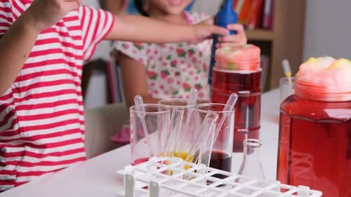 Children Enjoying a Science Experiment at Home