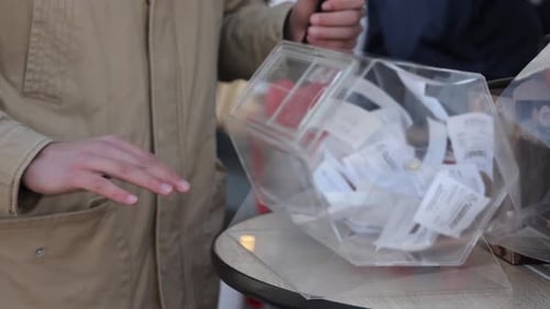 Shaking Lottery Drawing Box Full of Papers
