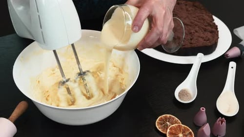 Mixing Creamy Frosting with Cake and Ingredients