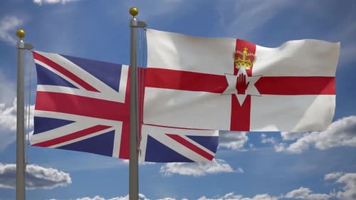 United Kingdom and Northern Irish Flags Waving in Wind