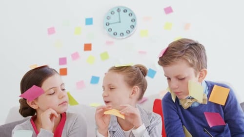 Children Engaged in Playful Brainstorming with Sticky Notes