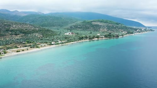 Drone Flying Over Beautiful Coastline with Turquoise Sea Water