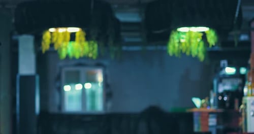 Two Young Adults Bowing and Bumping Fists in Gym