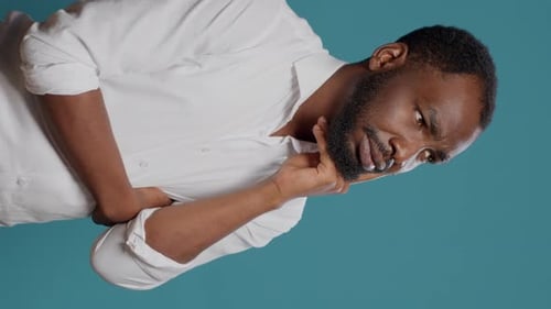 Vertical Video Pensive Young Adult Brainstorming Ideas to Find Solution