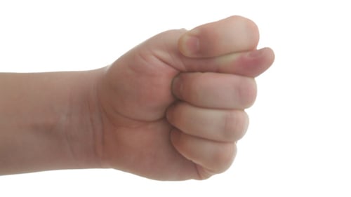 Hand Points Finger on White Background