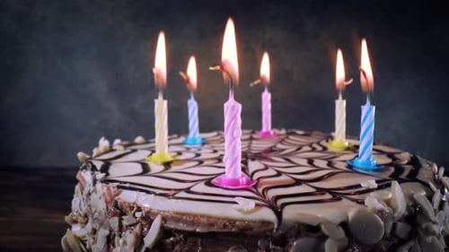 Birthday Cake with Lit Candles Close Up