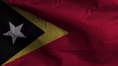 Flagge Osttimors, texturierter, winkender Hintergrund 4K