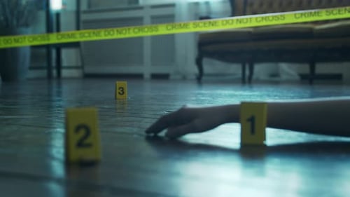 Hand and Evidence at Crime Scene Investigation