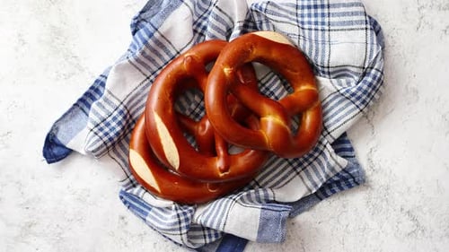 Overhead Shot of Bavarian Pretzels on Dish Towel