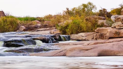 Wild Mountain River Flowing with Stone Boulders and Stone Rapids