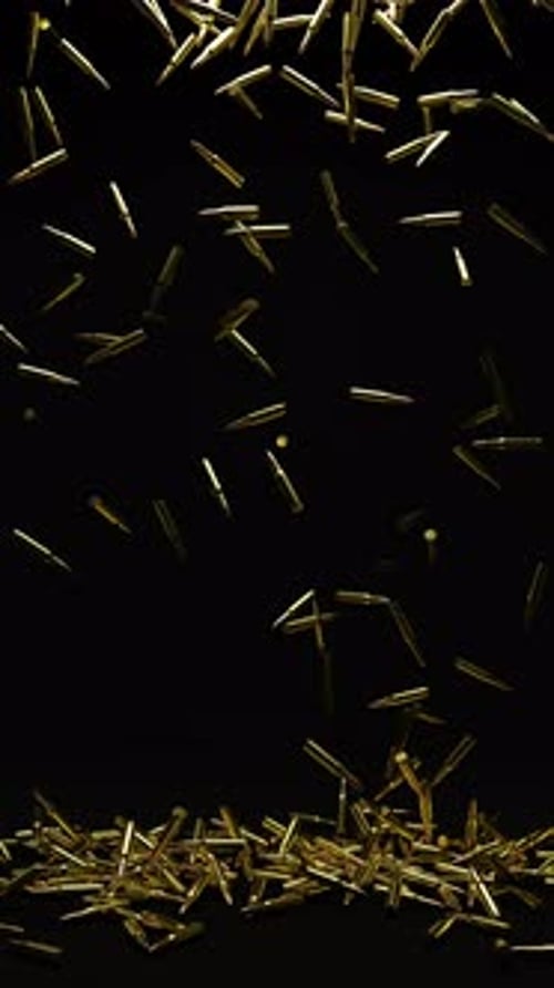 Golden Bullet Casings Falling in Slow Motion