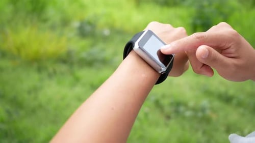 Arm Using Smart Watch Outdoors