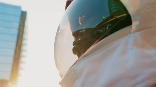 Close up of astronaut looking though helmet visor