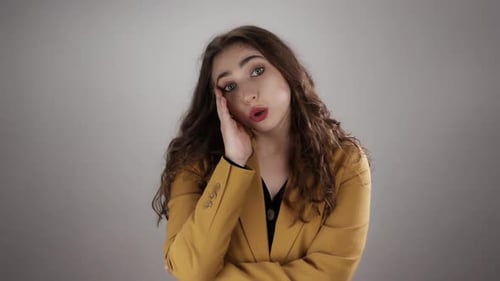 Woman with Hand on Face