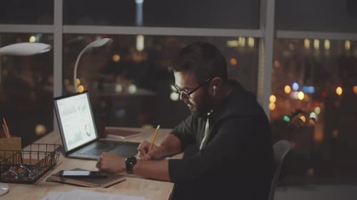 Businessman Working Late in Office
