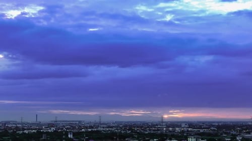City Lights Shine During Dawn Sunrise