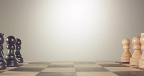 Special tracking macro shot moving between chess pieces on a chess board