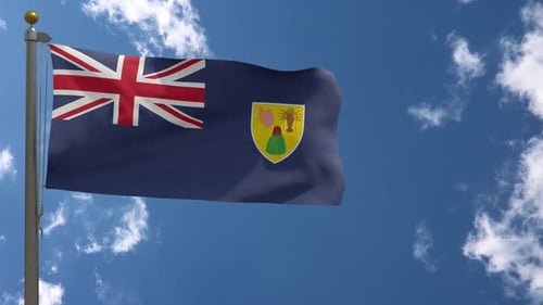 Turks and Caicos Islands National Flag Waving in Blue Sky