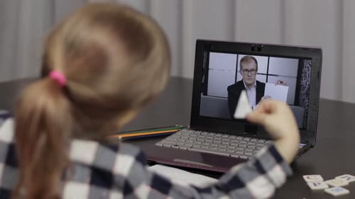 Girl Learning Online With Laptop and Instructor