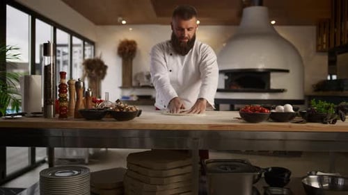 Pastry Cook Hands Knead Pizza Dough in Restaurant Kitchen