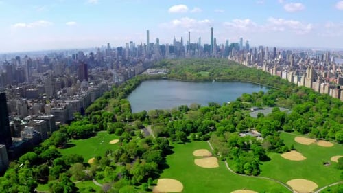 Aerial Video Above Green Central Park in the Middle of Manhattan New York