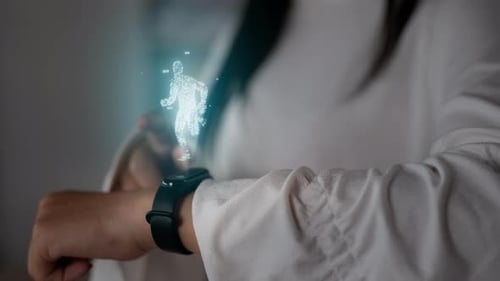 Woman Uses Smart Watch to Monitor Running Stats