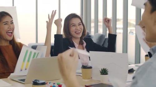 Team Celebrates Success in the Urban Office