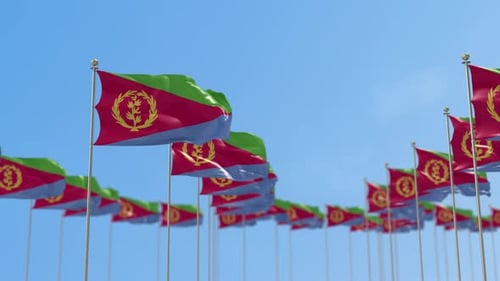 Waving Eritrean Flags Against Clear Blue Sky