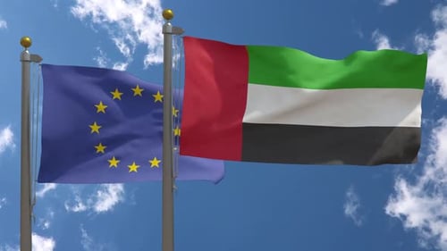 European Union and United Arab Emirates Flags Waving on Flagpoles