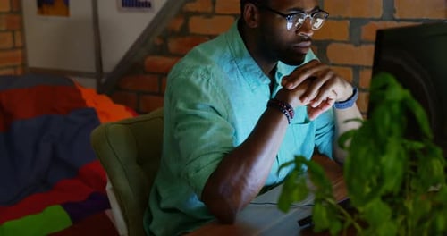 Businessman working on computer in a modern office 4k