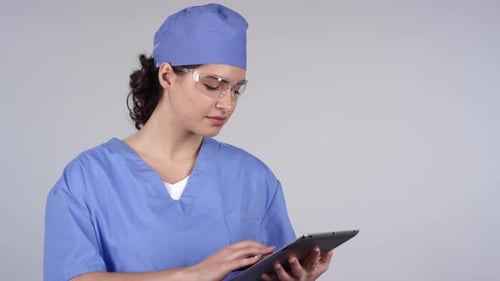 Portrait of Nurse with Tablet