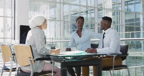Young business people meeting in a modern office