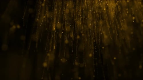 Abstract Golden Shimmering Particles Falling Background Loop